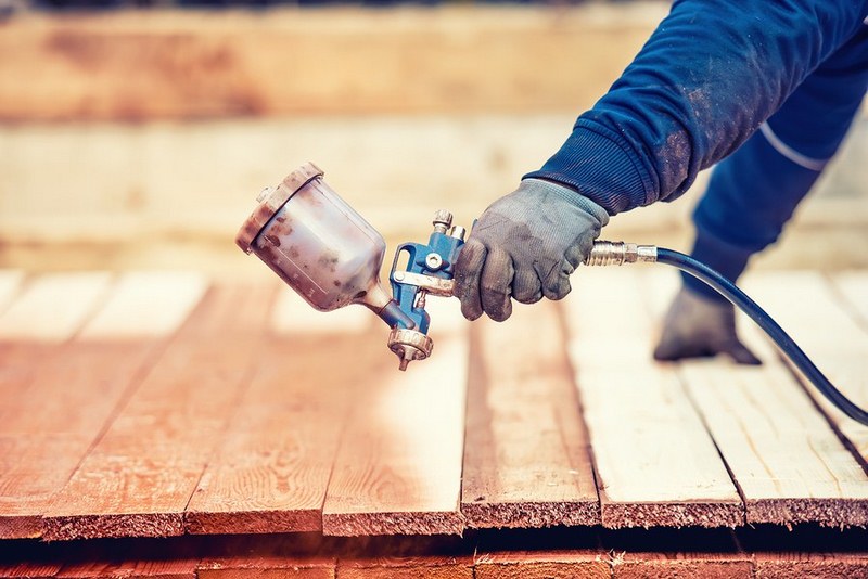 Applying Wood Stain with Sprayer Applying Wood Stain with Sprayer