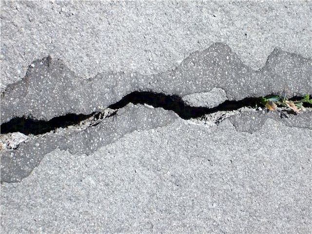 Large Crack on Driveway - How to Repair Crack in Poured Concrete Foundation