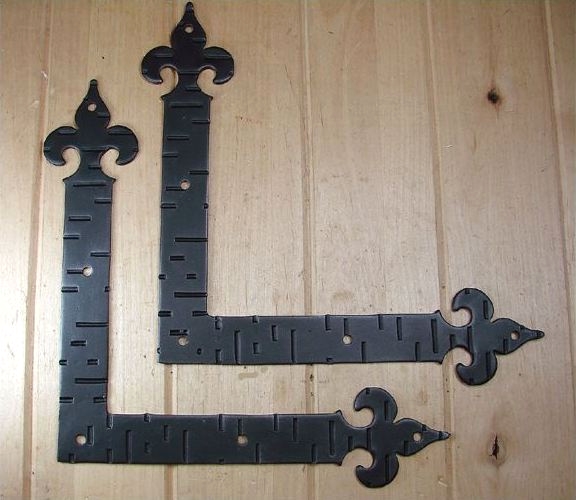 Decorative L-brackets make for a nicer looking project Decorative L-brackets make for a nicer looking project - How to Build a Sliding Barn Door, DIY Sliding Barn Door