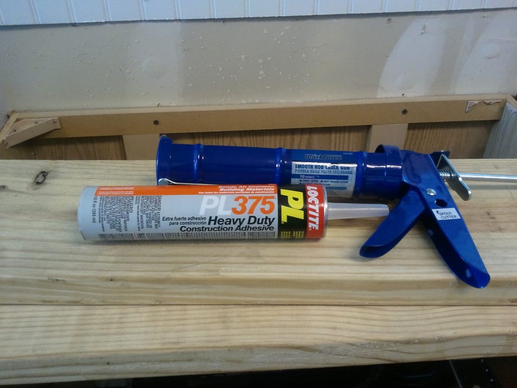 DIY Faux Butcher Block Countertops Tutorial 17 Construction Grade Adhesive - Glue the Planks Down to the Cabinets