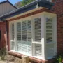 featured image - What Is the Best Material for Plantation Shutters?