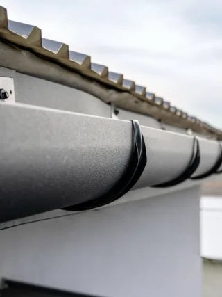 featured image - Choosing the Right Materials and Profile for Your Guttering System