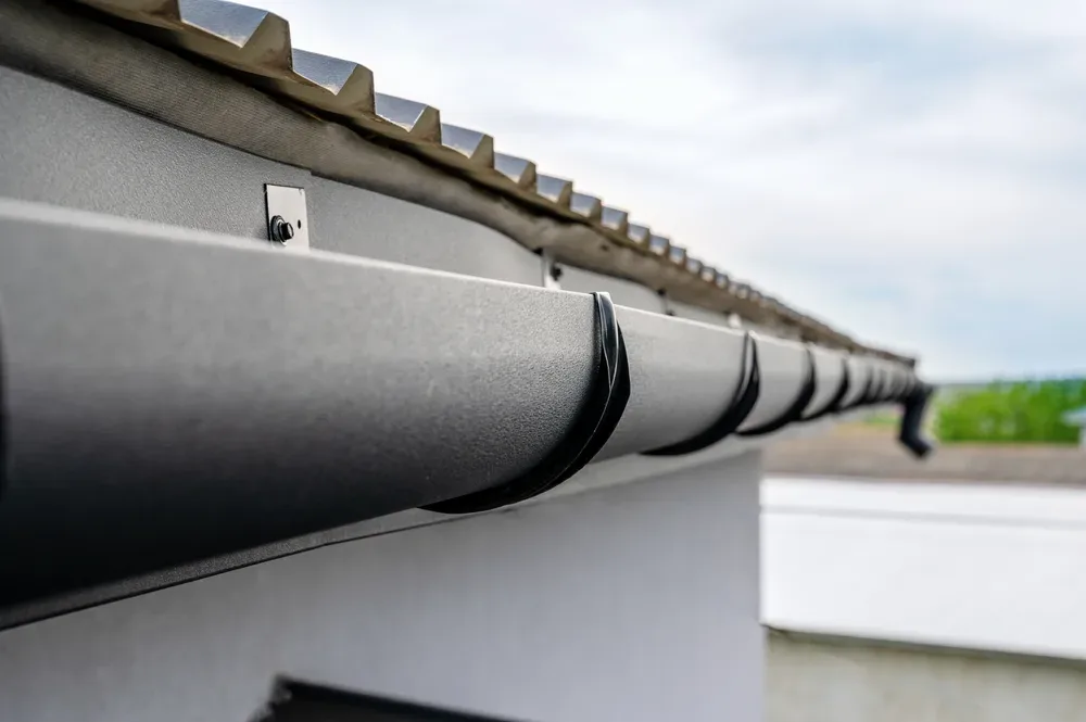 featured image - Choosing the Right Materials and Profile for Your Guttering System