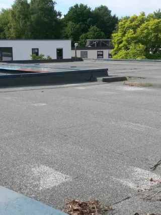 featured image - Why Choose a Flat Roof Top 3 Benefits