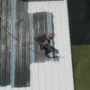 featured image - Why Silicone Roof Coating Is Cost-Effective Than Re-Roofing