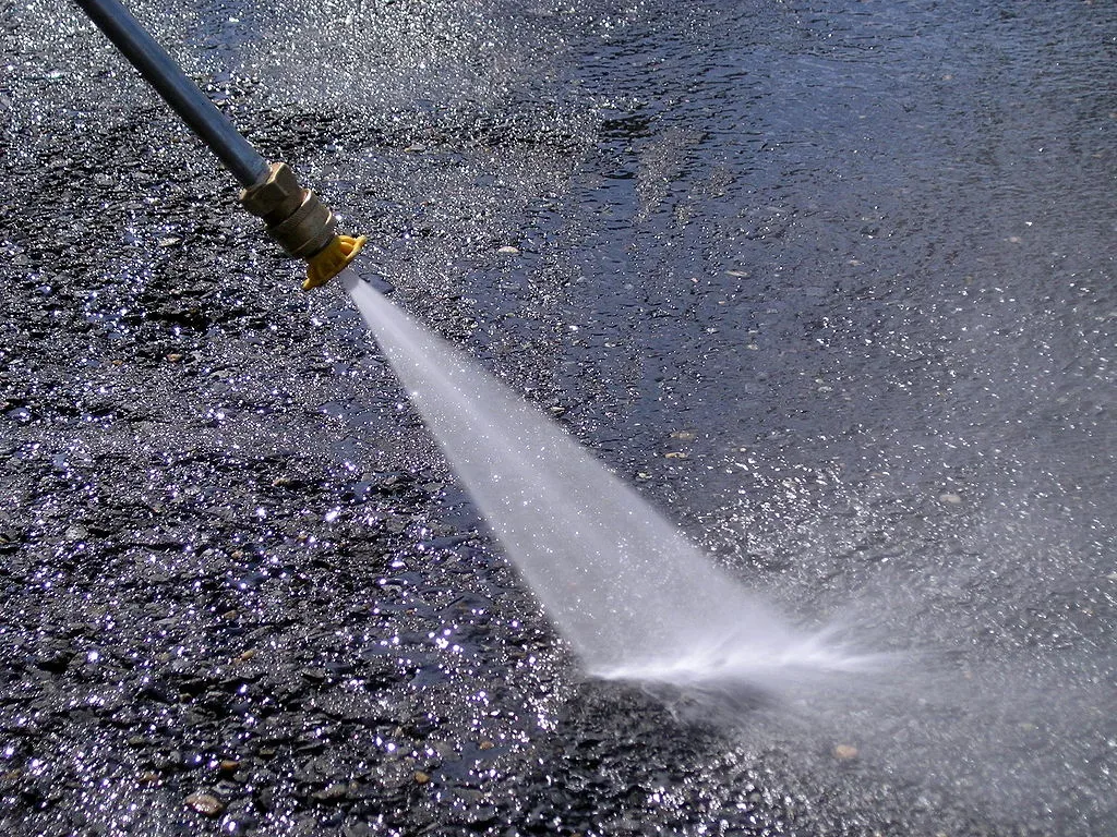 featured image - What Is the Difference Between a Power Washer and A Pressure Washer