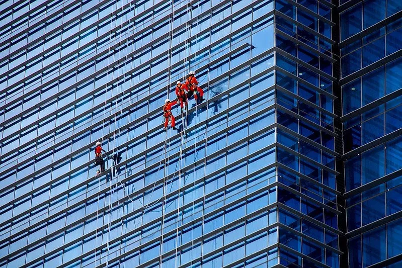 featured image - What do Professional Window Cleaners Use to Clean Windows?