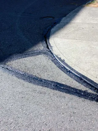 fetured image - All You Need to Know About Driveway Sealing