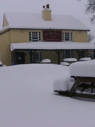 featured image - How to Safely Remove Snow from Your Roof
