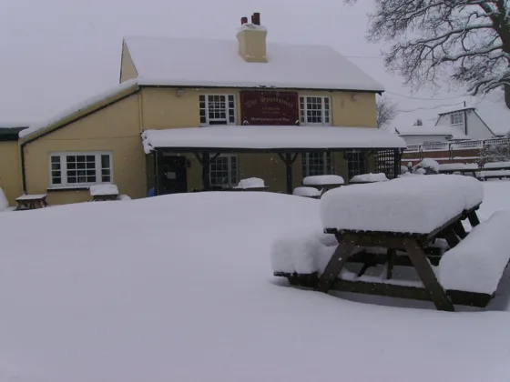 featured image - How to Safely Remove Snow from Your Roof
