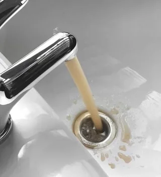 featured image - Is Your Well Water Running Brown? Here's Why (And What You Can Do About It)