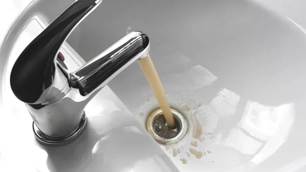 featured image - Is Your Well Water Running Brown? Here's Why (And What You Can Do About It)