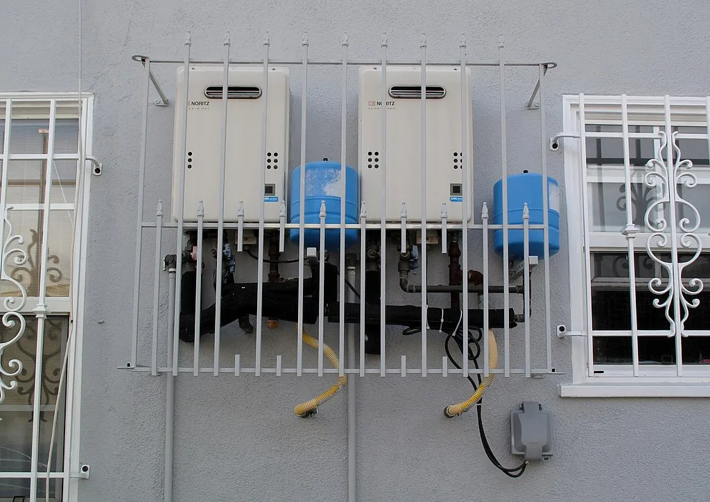 featured image - Water Heaters Tankless Vs Hybrid, Which One Is Right for You