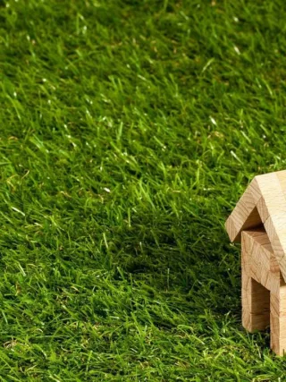 featured image - How to Install Artificial Grass on Dirt