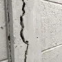 featured image - The Cost of Foundation Crack Repair & When to Call an Expert