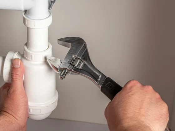 featured image - How to Save Money on Plumbing Repairs