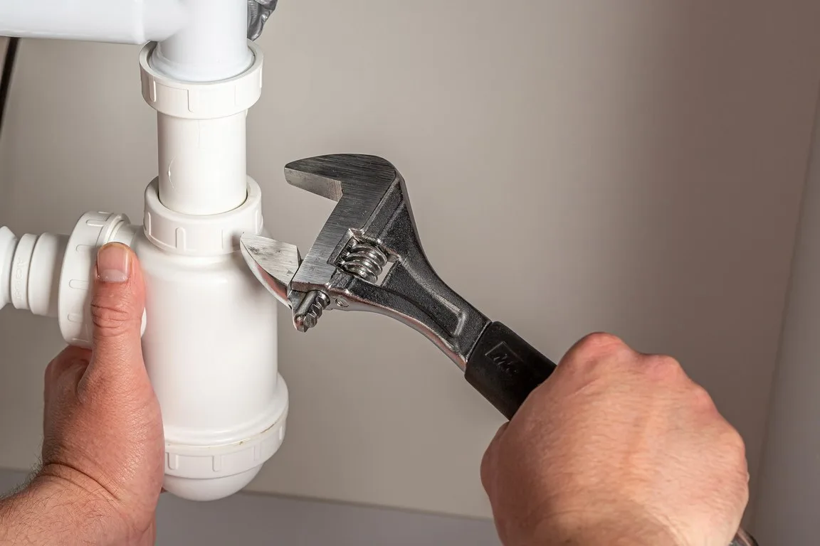 featured image - How to Save Money on Plumbing Repairs
