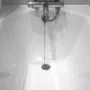 featured image - 4 Simple Yet Effective Ways to Block a Bathtub Drain Without a Plug