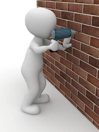 featured image - How to Drill a Hole in a Wall