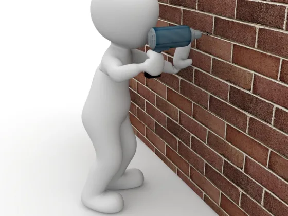 featured image - How to Drill a Hole in a Wall