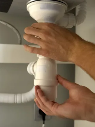 featured image - How to Install an Under Sink Plumbing Vent