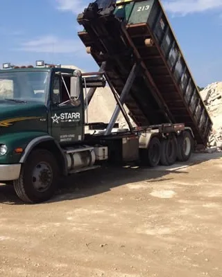 featured image - How to Remove Materials from Your Home Safely Using Dumpster Services