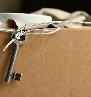 featured image - Moving to Another City? 7 Tips To Make it Less Stressful