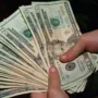 featured image - The Pros and Cons of Taking a Cash Offer When You Sell Your Home