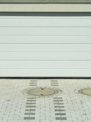 featured image - How to Weather-Seal Your Garage Door?