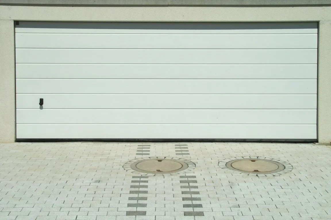 featured image - How to Weather-Seal Your Garage Door?