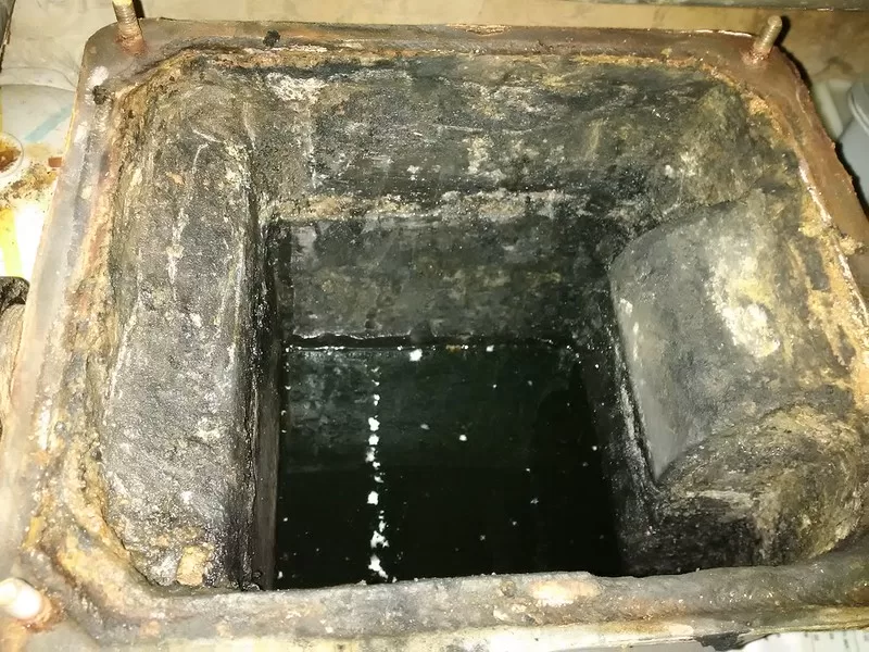 featured image - Grease Trap Cleaning How Often Should You Clean It