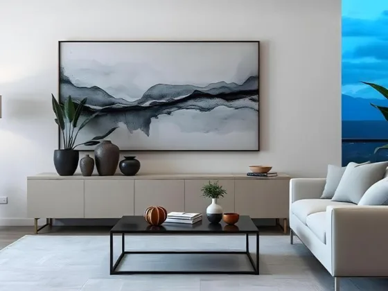 Stylish console table and artwork create a relaxing space.
