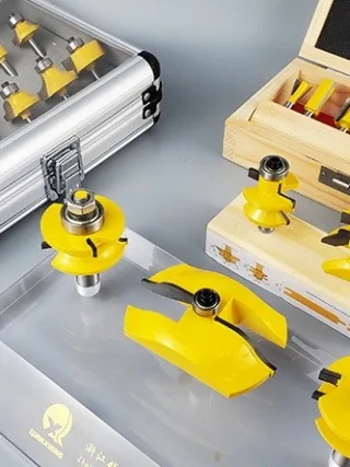 Essential woodworking router bits laid out on a wooden workbench for DIY use